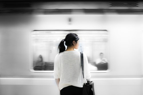 Chosen image of truth for post. Still woman looking at a moving train with her head turned.